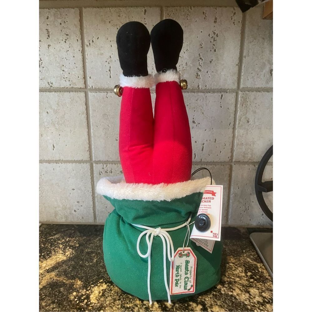 New Mr. Christmas Animated Christmas Santa Kicker in Bag 15"